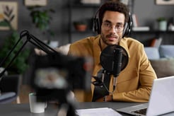 young-man-recording-podcast-medium-shot (1)
